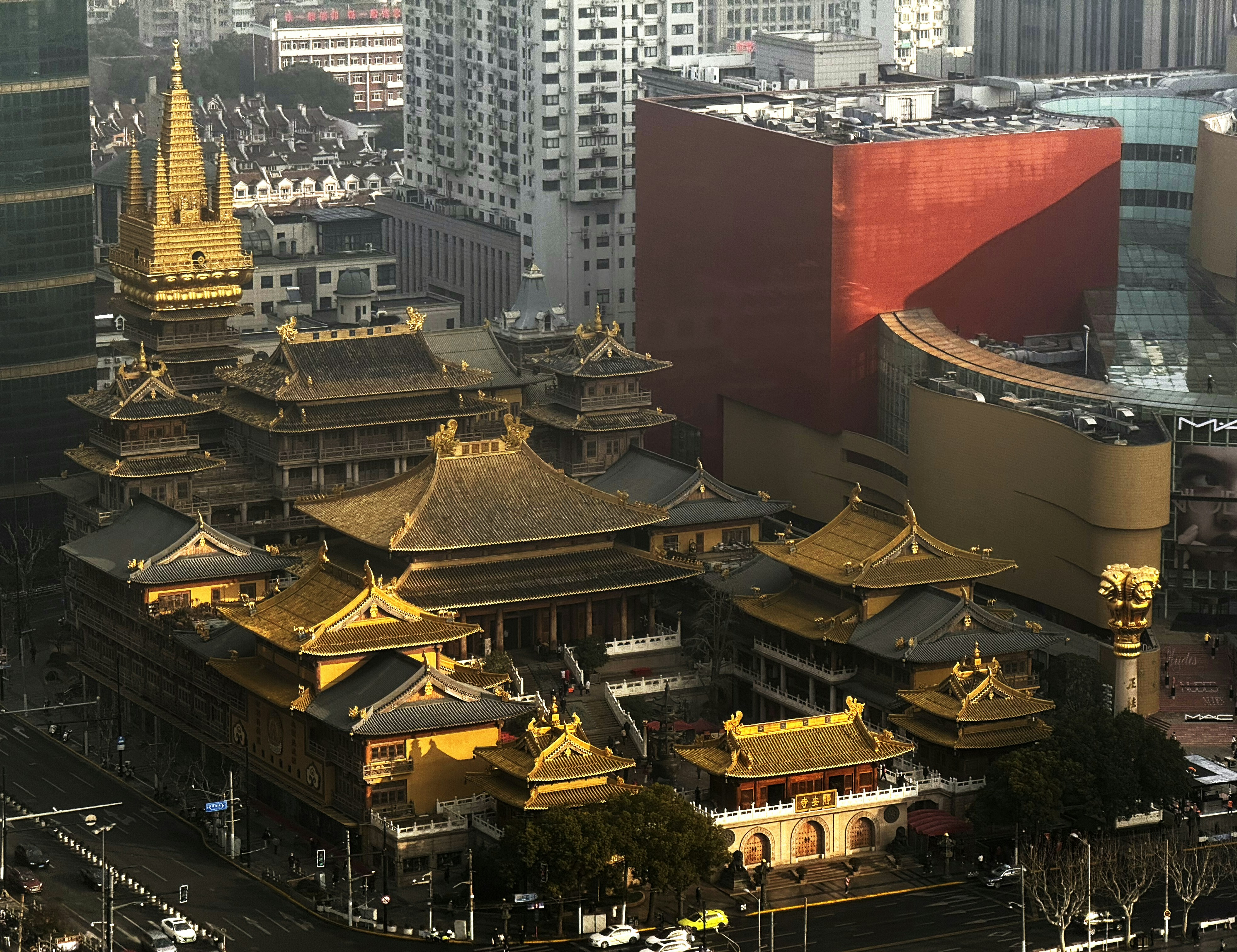 An aerial view of a city with tall buildings