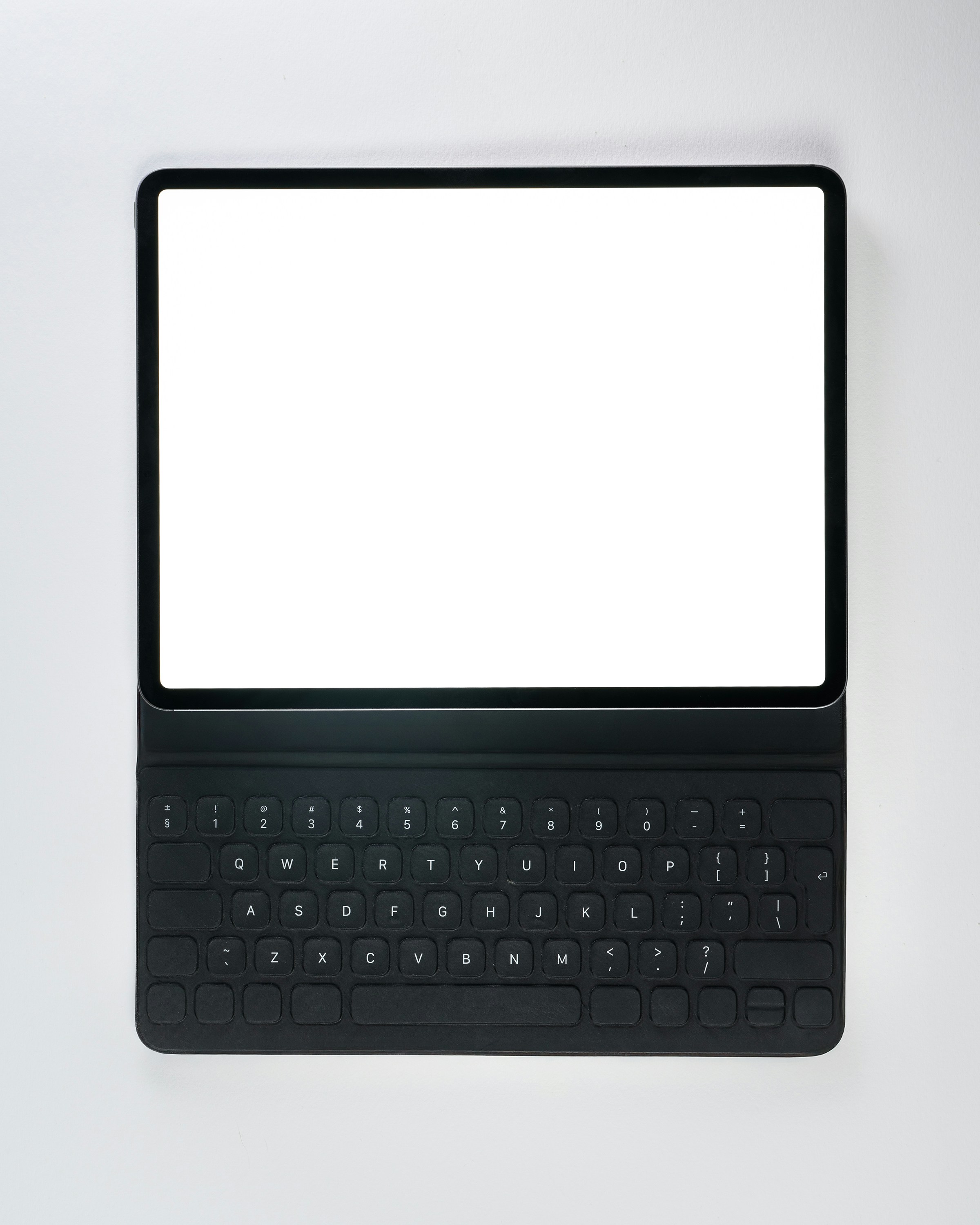 A black laptop computer with a white screen