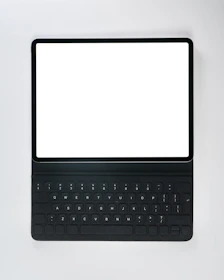 A black laptop computer with a white screen