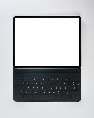 A black laptop computer with a white screen