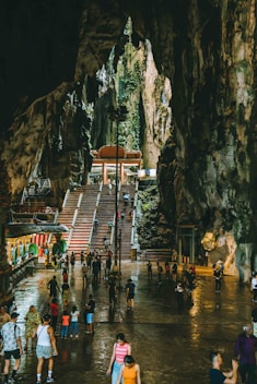 A group of people standing in a cave