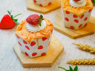 Strawberry shortcakes with whipped cream and strawberries