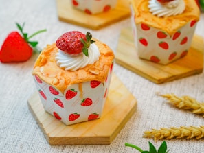 Strawberry shortcakes with whipped cream and strawberries