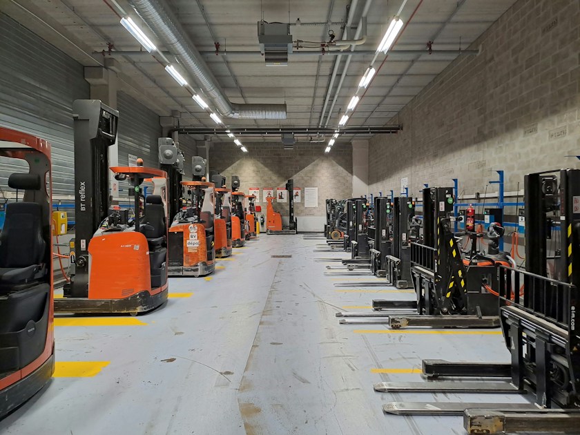 A large warehouse filled with industrial equipment