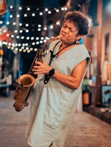 A woman playing a saxophone in Havana Jazz Festival private intimate performance