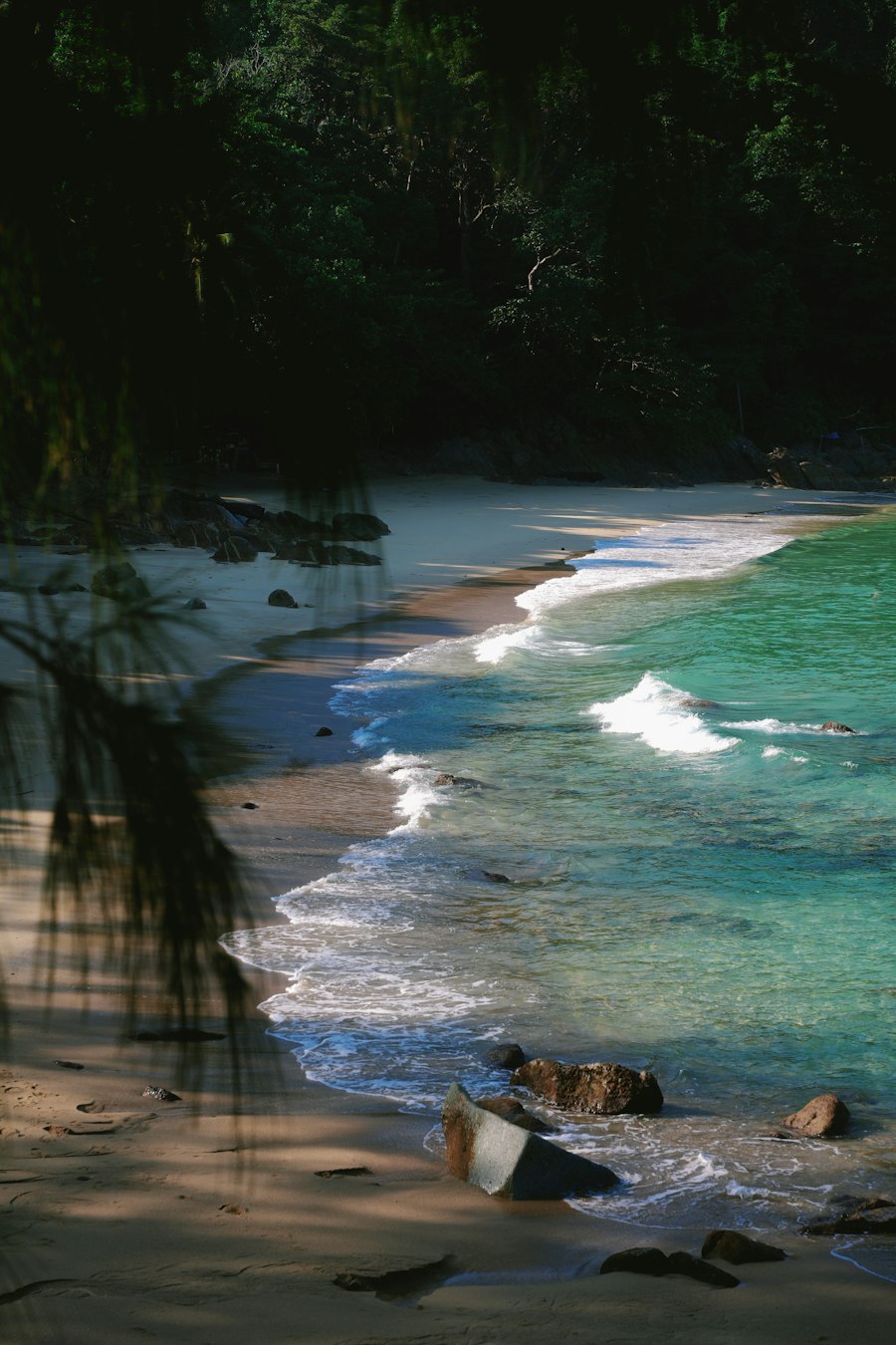 Waves on a sandy beach in Phuket