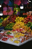 A fruit stand with a variety of fruits and vegetables