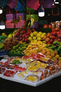 A fruit stand with a variety of fruits and vegetables