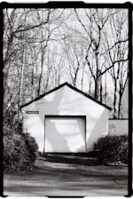 A black and white photo of a garage
