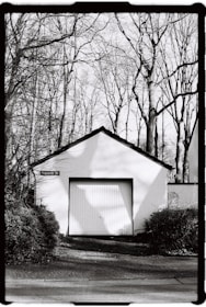 A black and white photo of a garage
