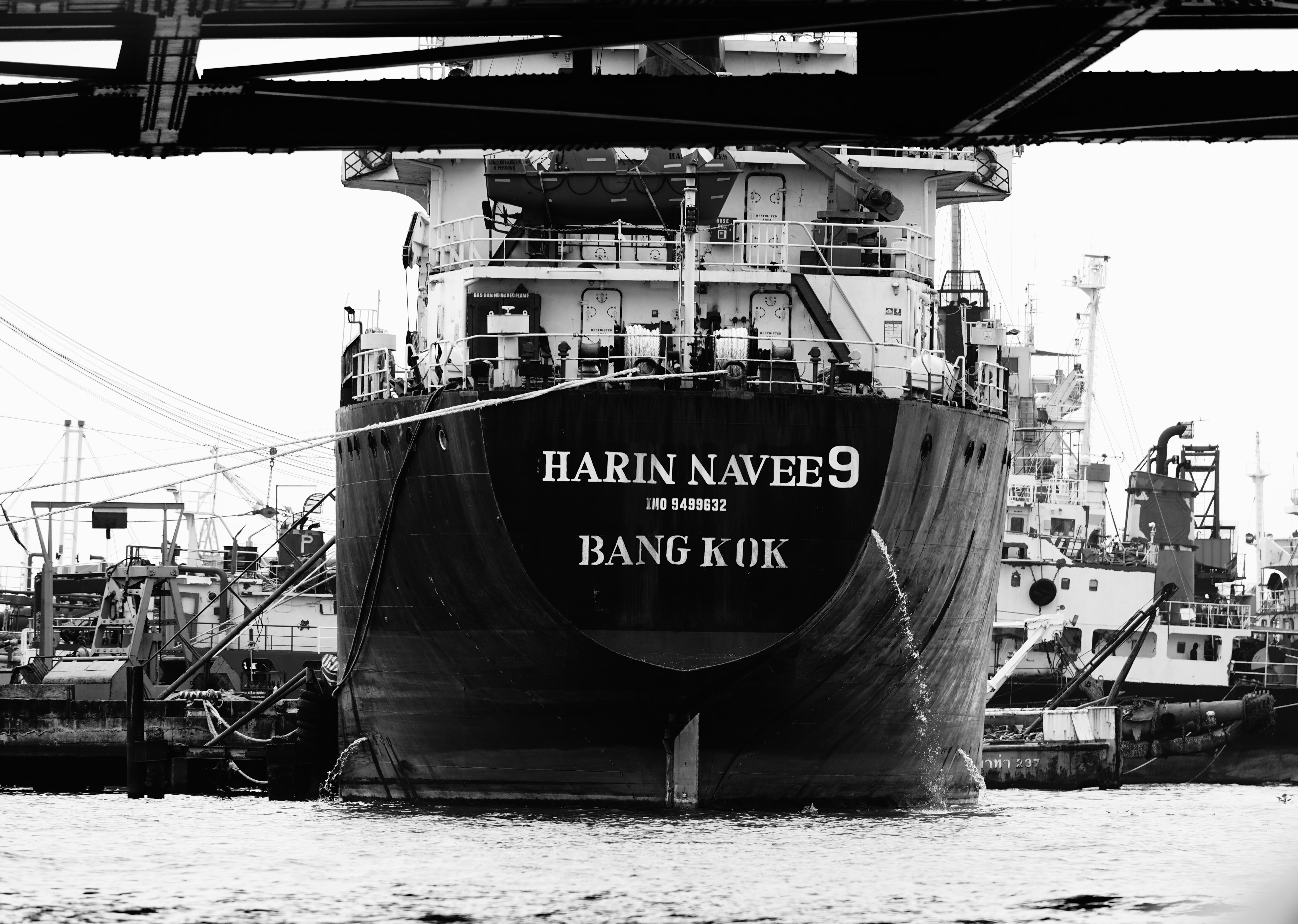 A cargo ship is docked in bangkok.