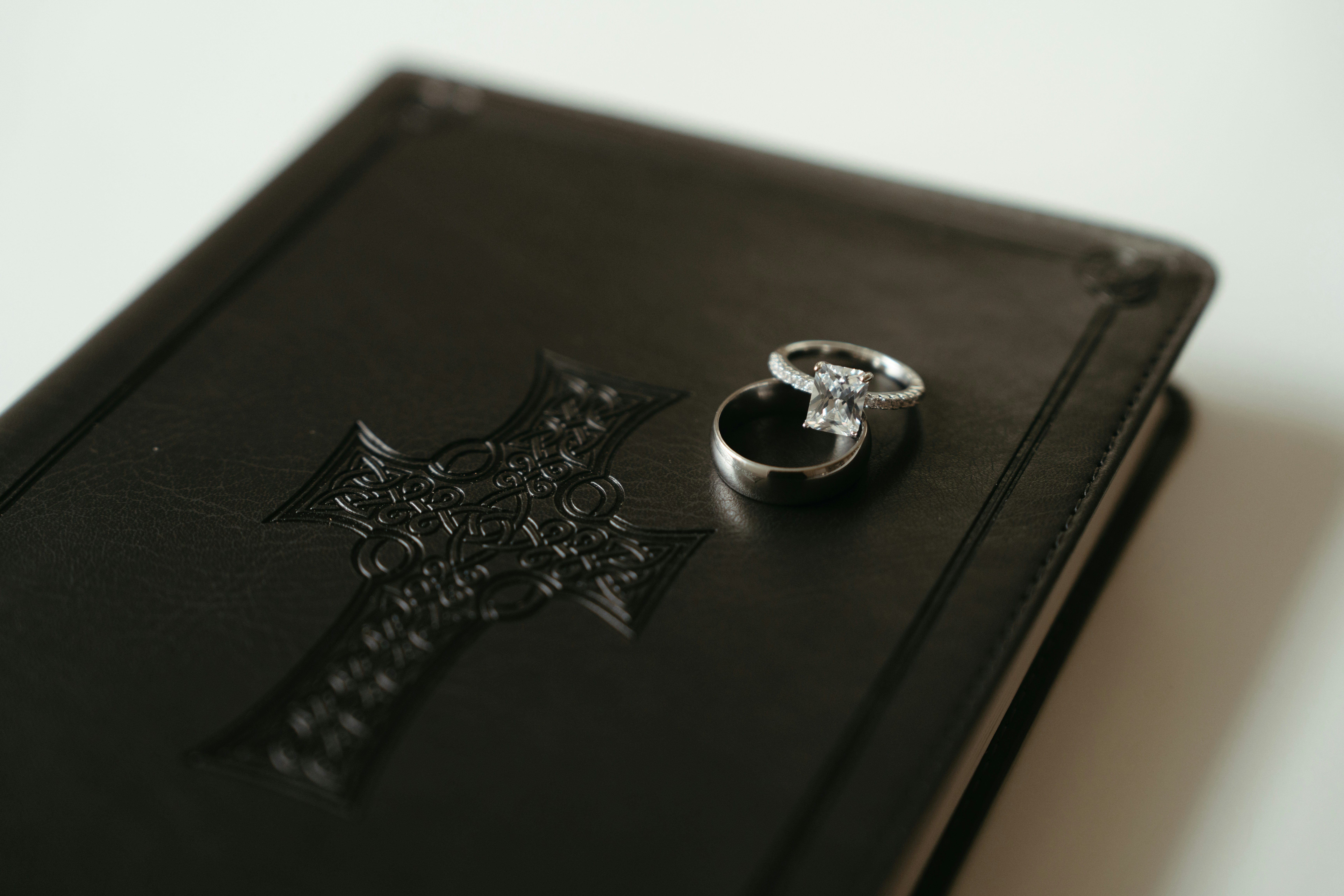 A book with a ring on top of it