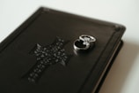 A book with a ring on top of it