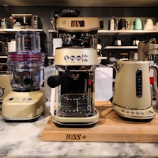 A counter top with a blender and a blender on it