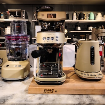 A counter top with a blender and a blender on it