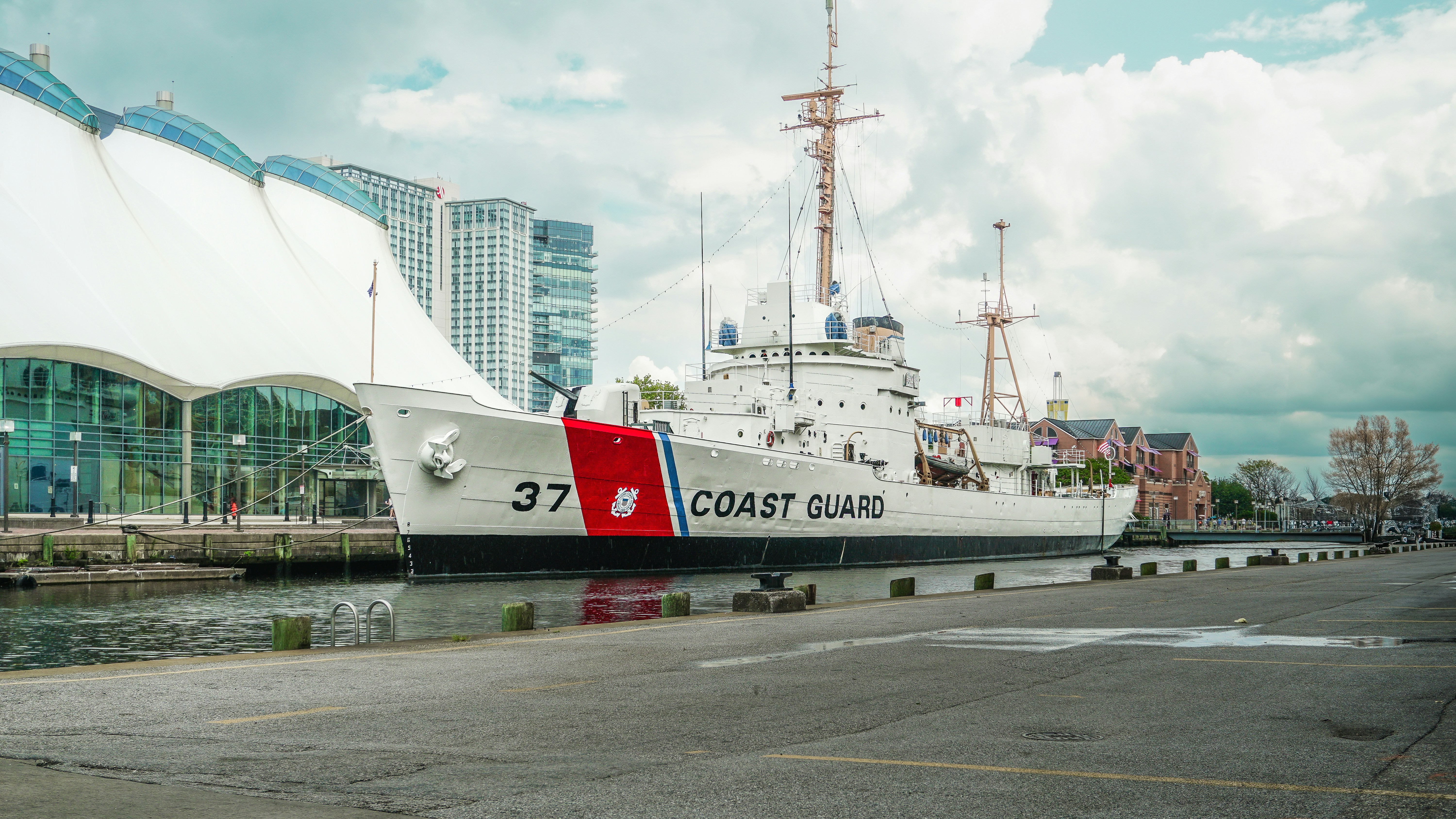 Coast Guard cutter ship - A coast guard cutter ship docked at harbor.