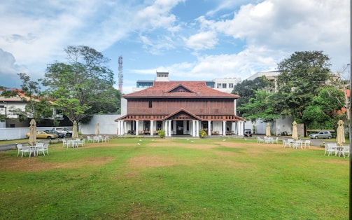 A view of a building from across the lawn
