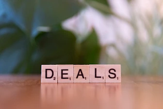 A close up of a scrabble type word on a table