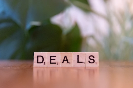 A close up of a scrabble type word on a table