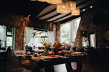 An elegant interior of a restaurant with food.