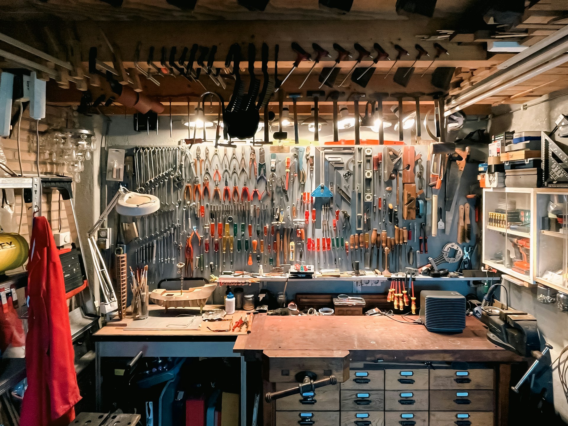 A well-organized workshop with tools on display.