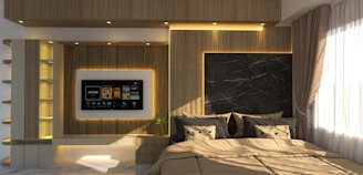 A luxurious bedroom with a TV and bed.