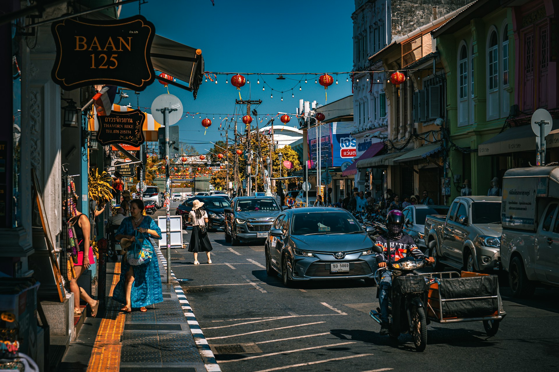 Busy street scene in a vibrant asian city.
