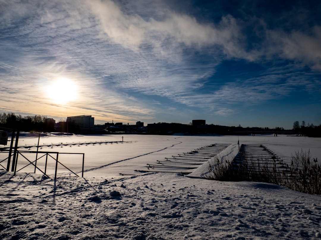 A snowy landscape with a bright sun.