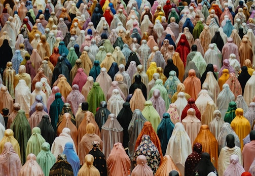 A large group of people standing in a crowd