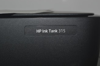 A close up of a hp ink tank