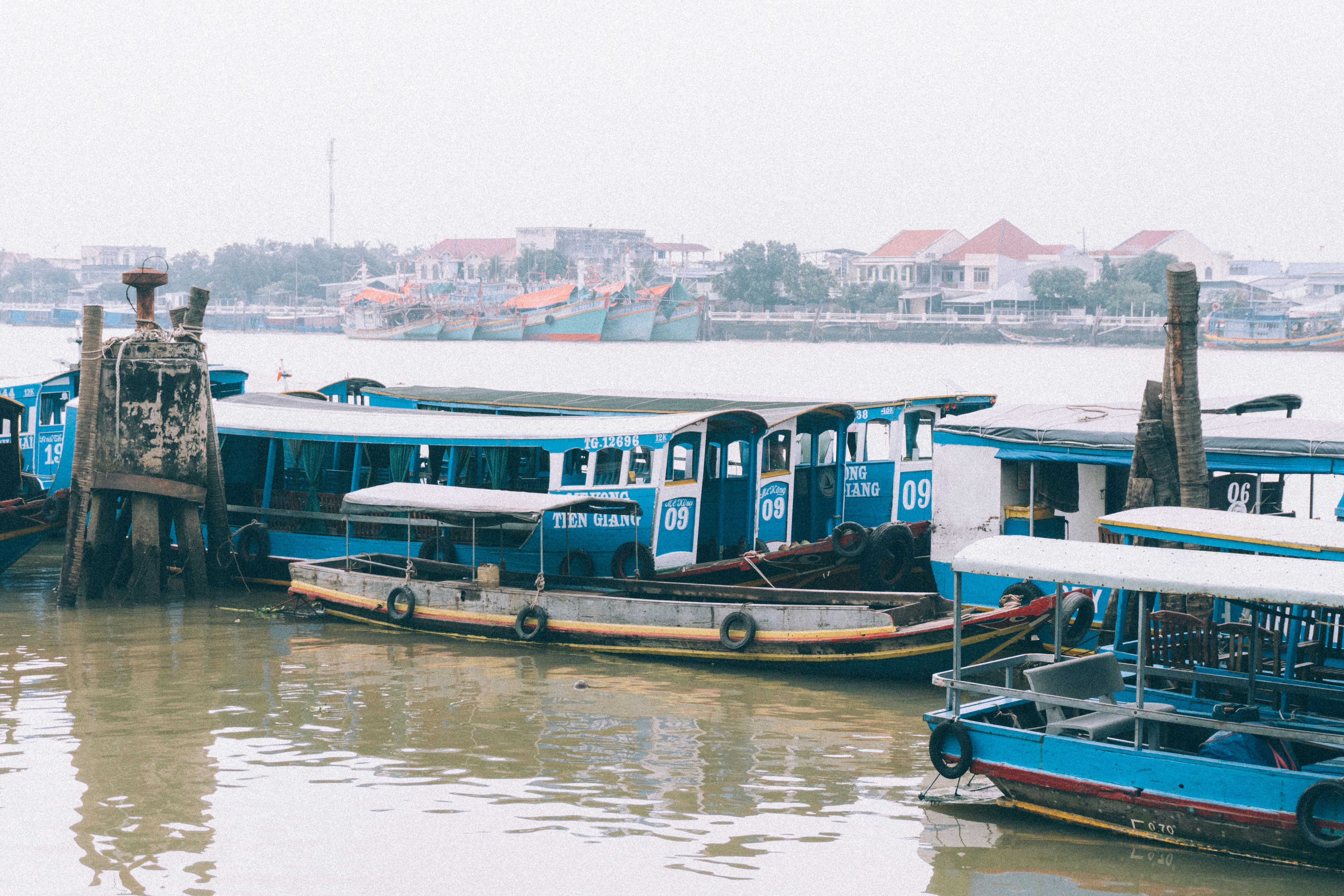 A bunch of boats that are sitting in the water