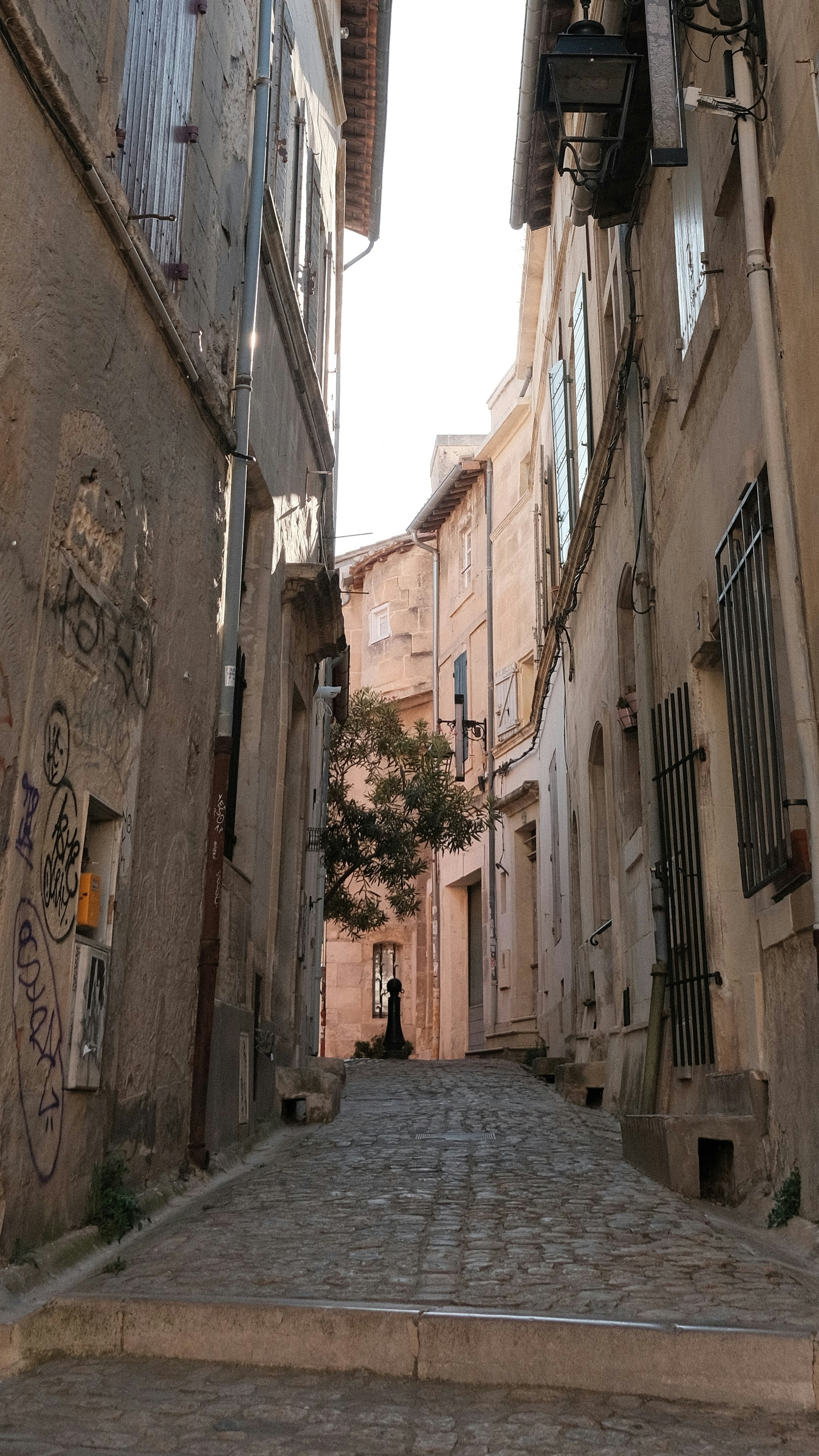 A cobblestone street in a small town