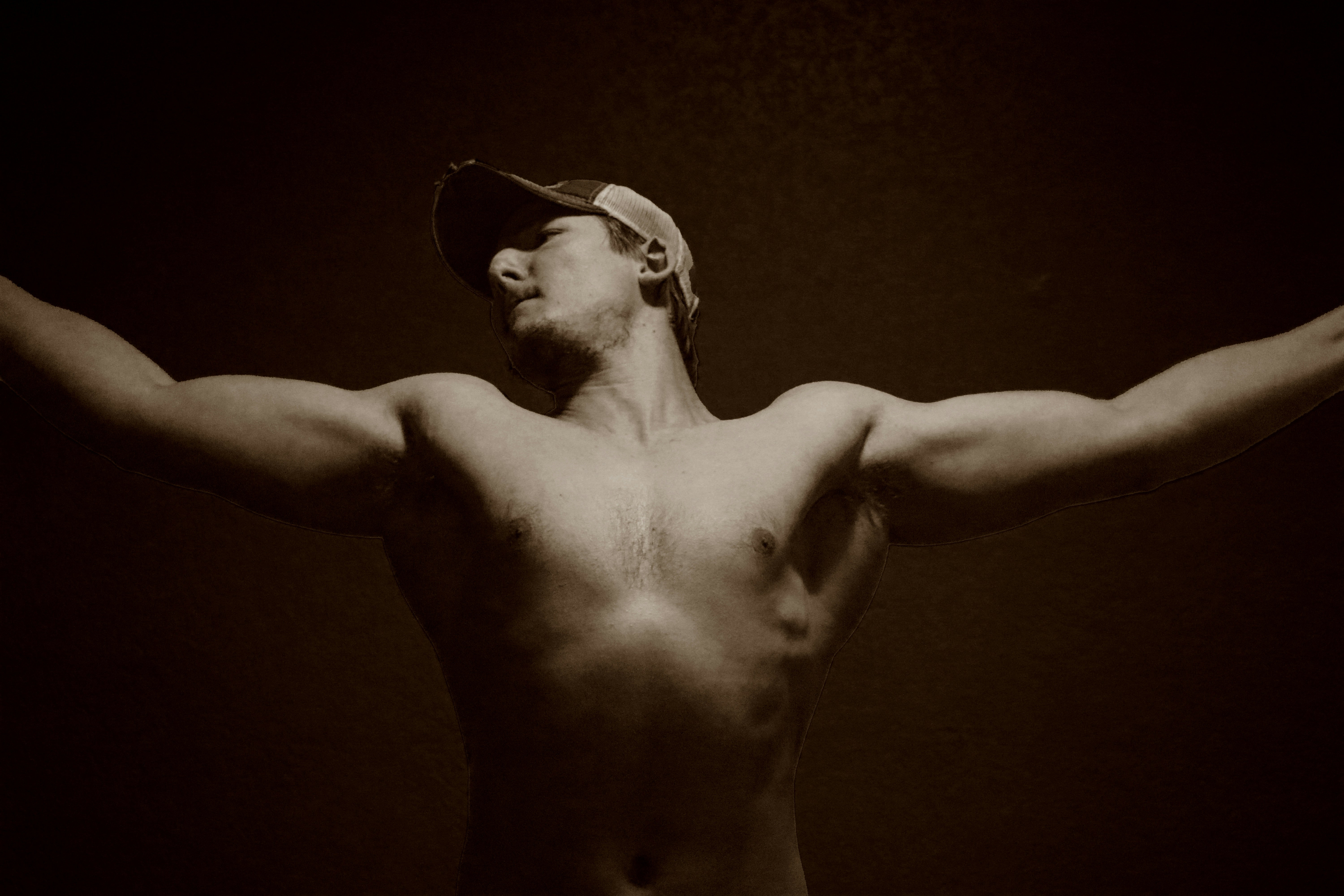 Man celebrating with arms raised