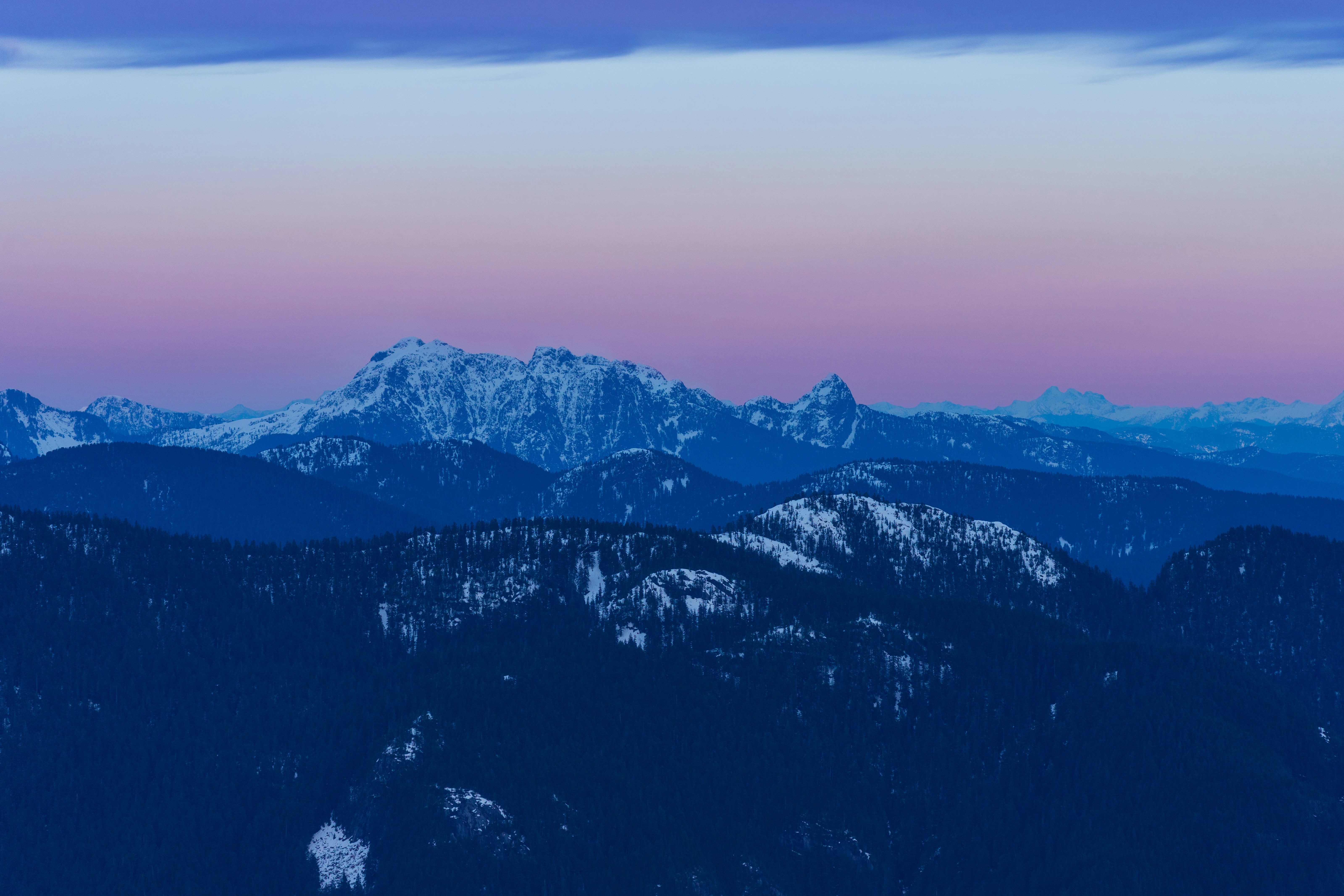 A view of a mountain range at dusk