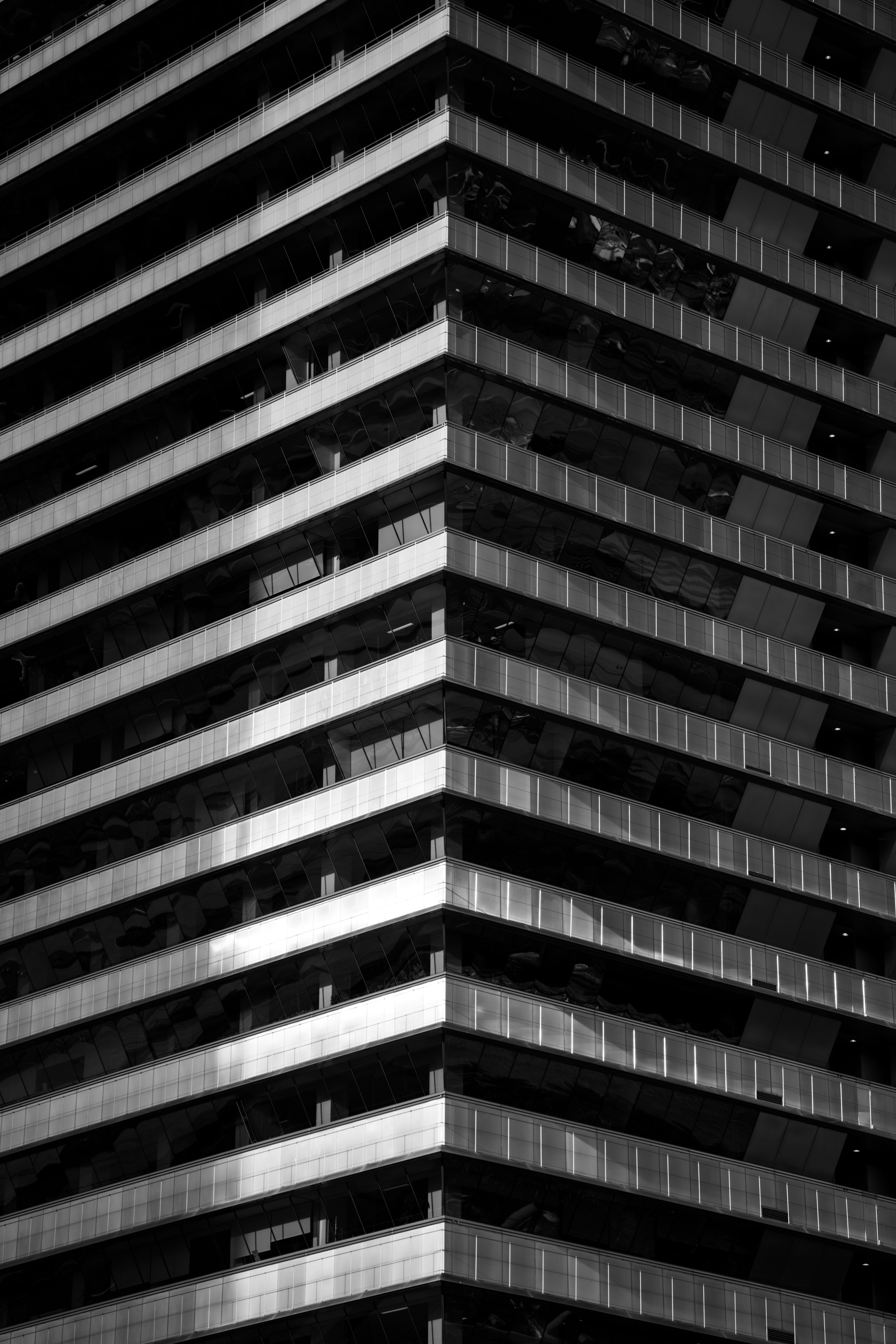 A black and white photo of a tall building