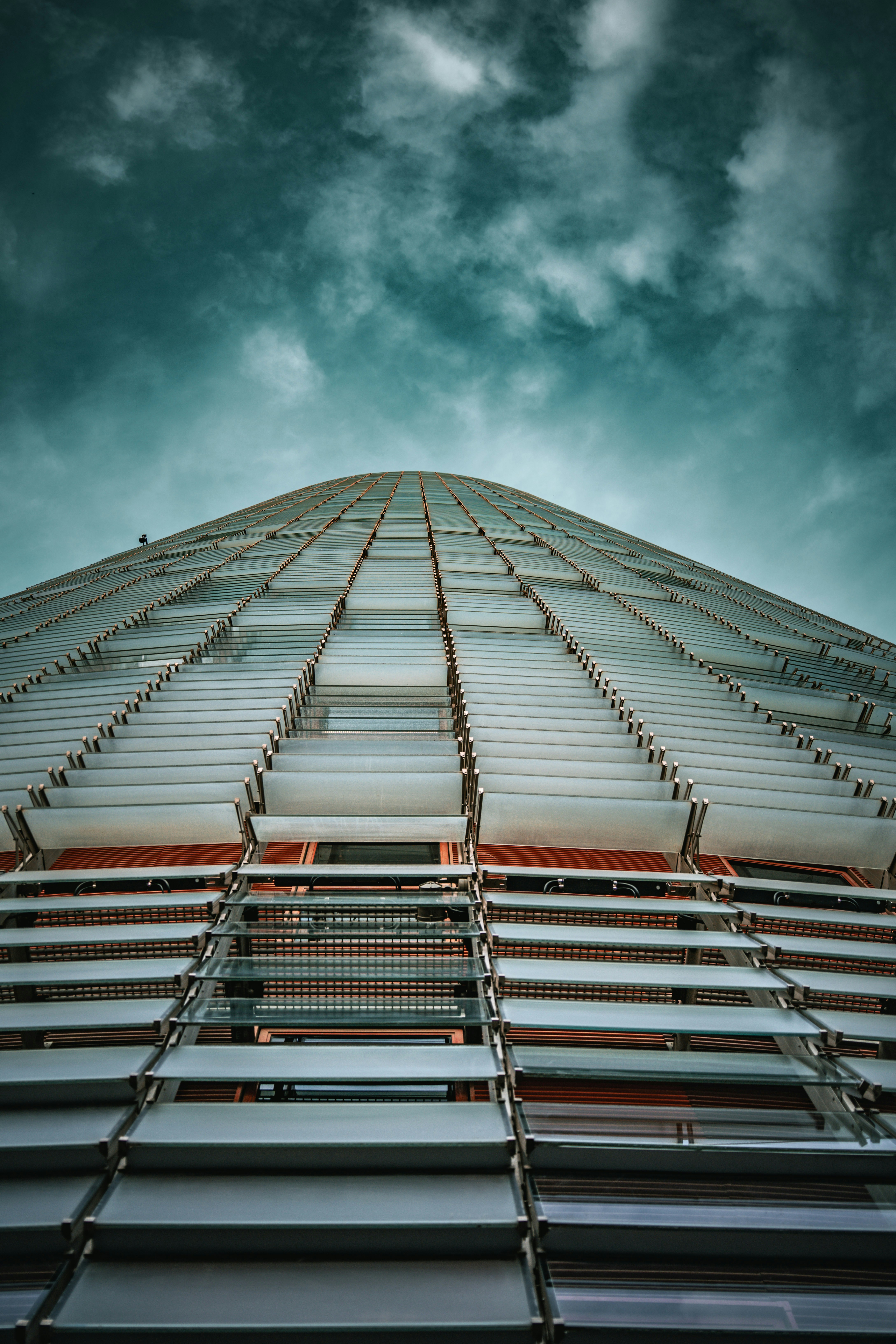 A tall building with a sky background