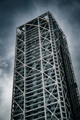 A tall building under a cloudy sky