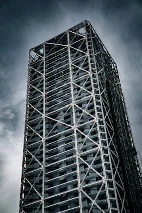 A tall building under a cloudy sky