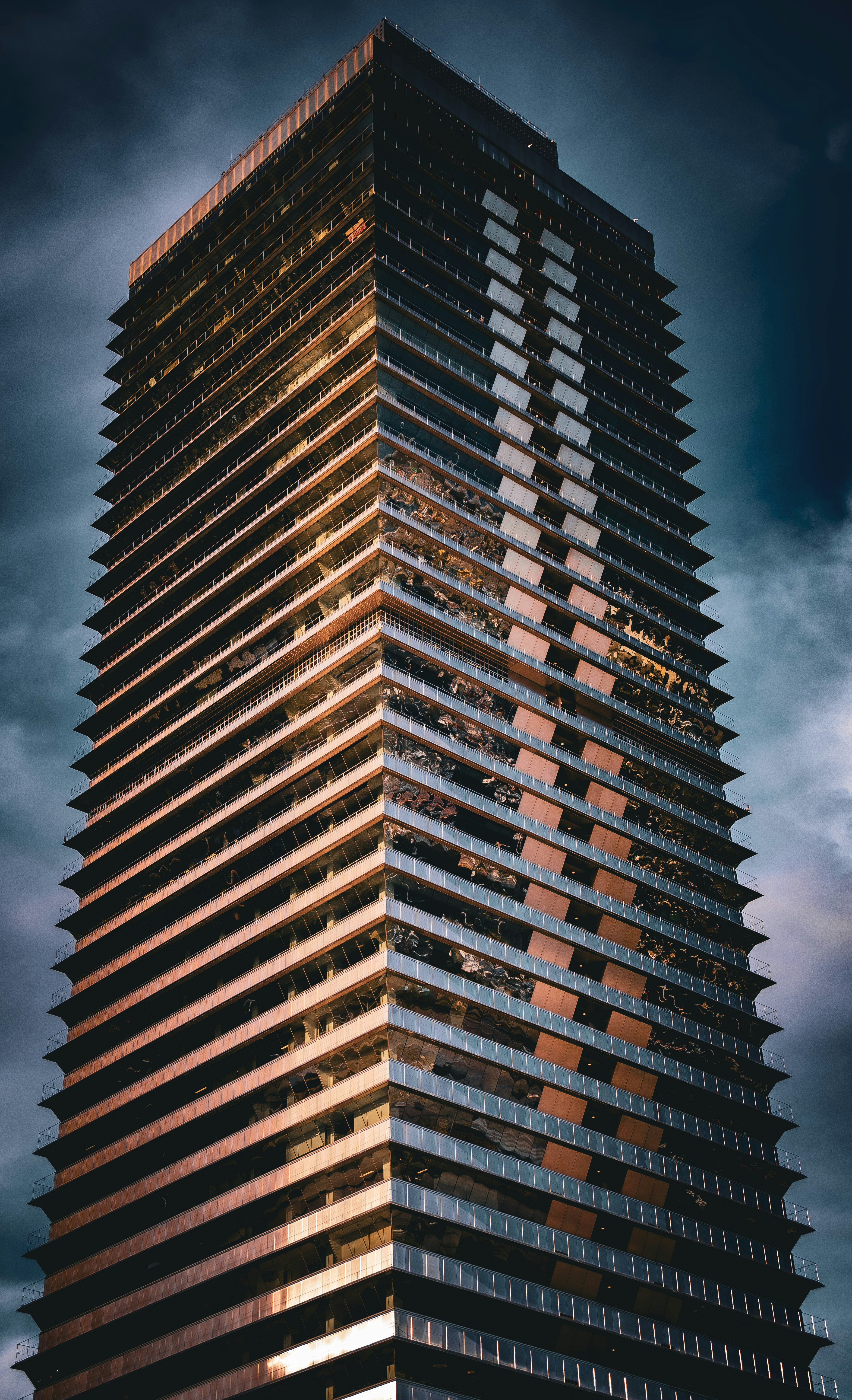 A very tall building with a sky background