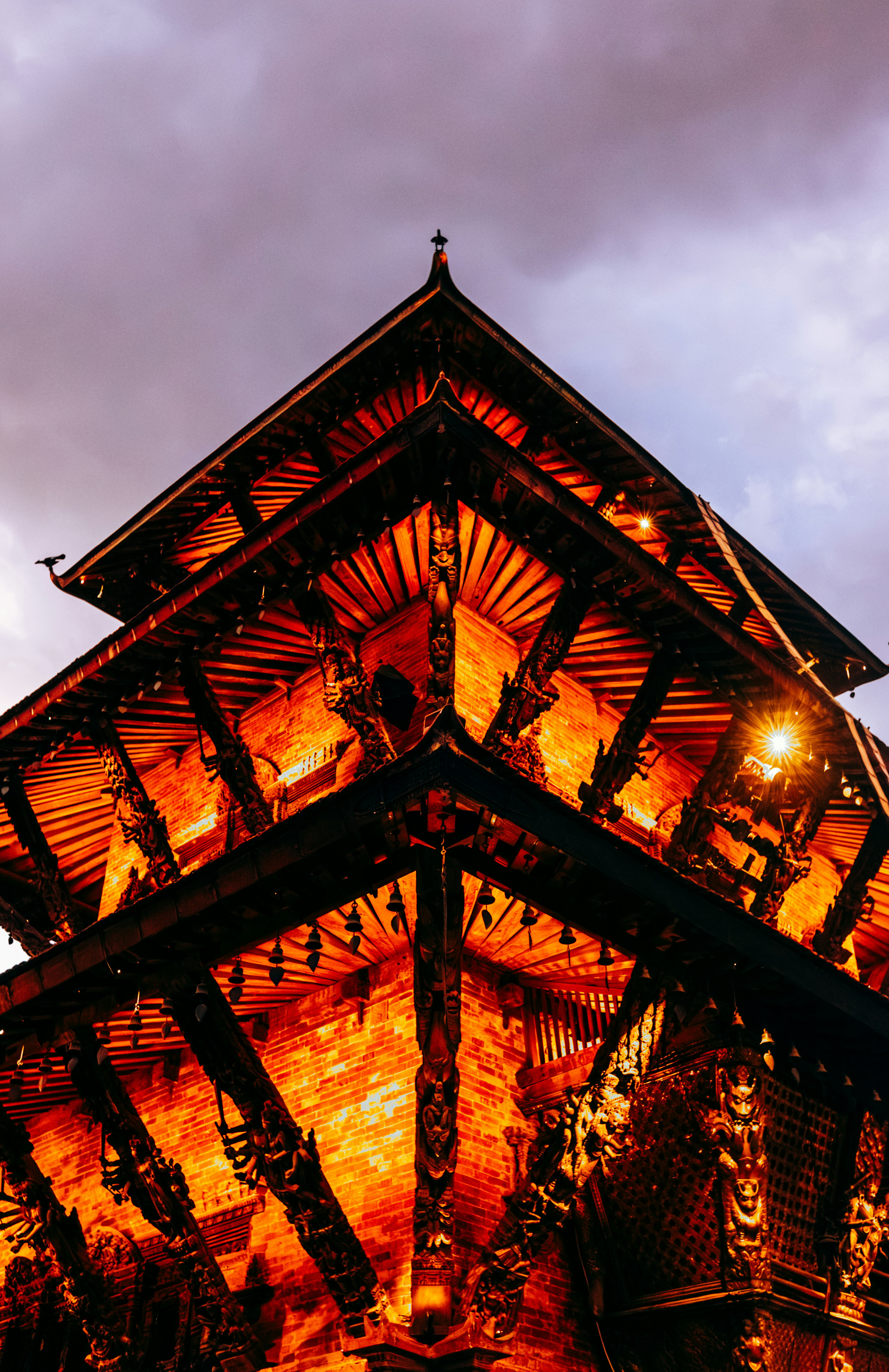 A tall building with a clock on the top of it