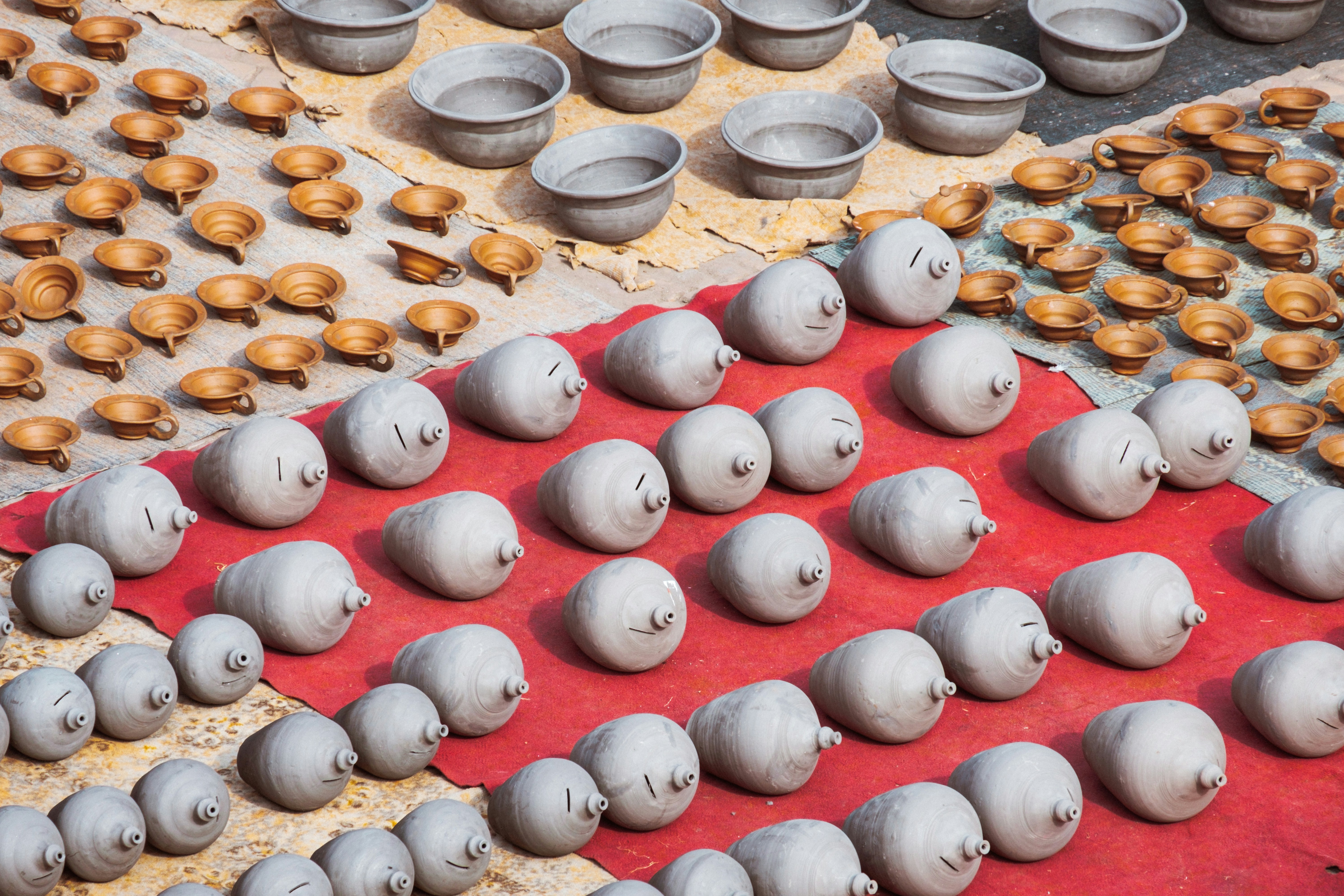 A table topped with lots of pots and pans