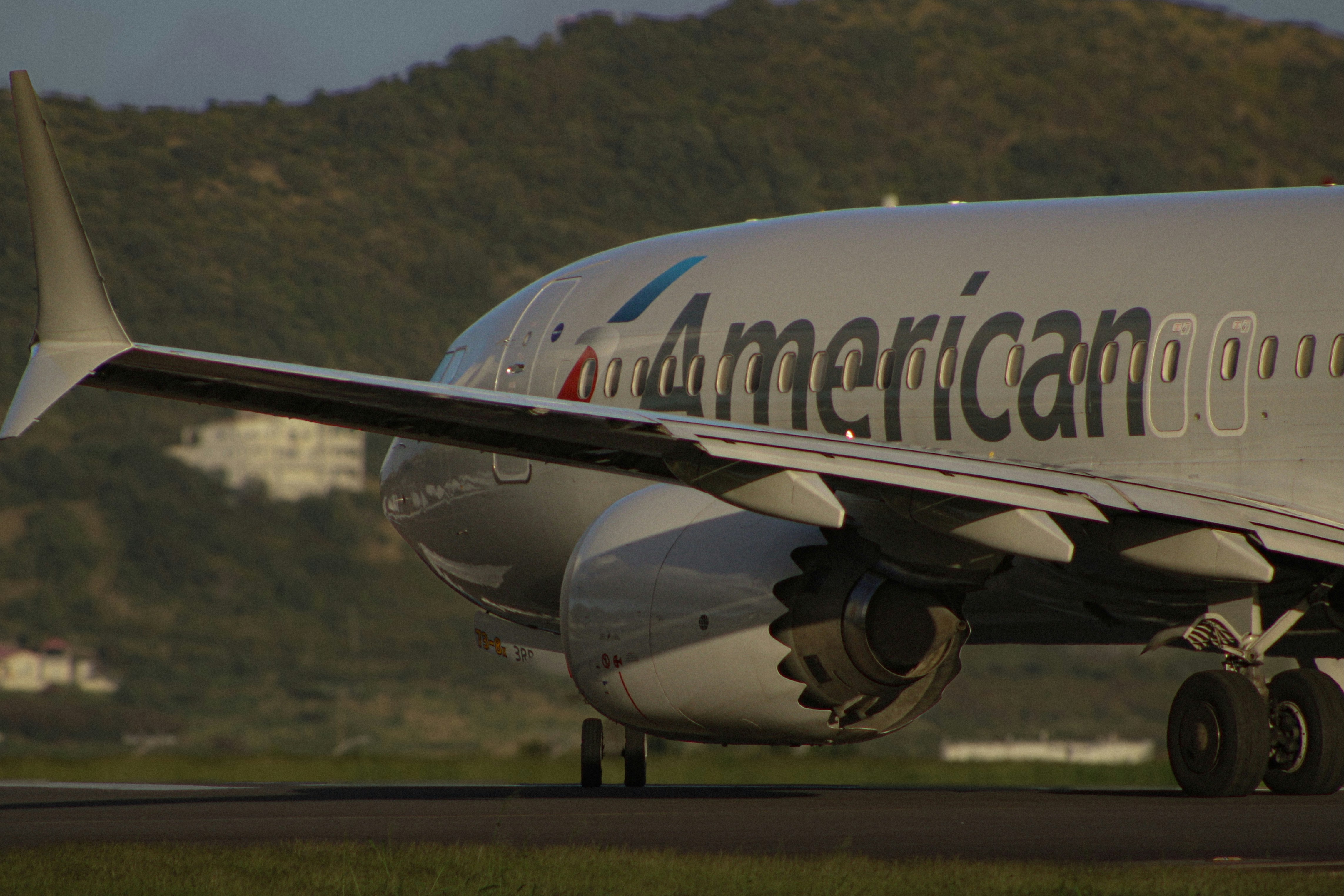 An american airlines plane is on the runway