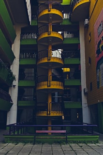 A very tall building with a bunch of balconies