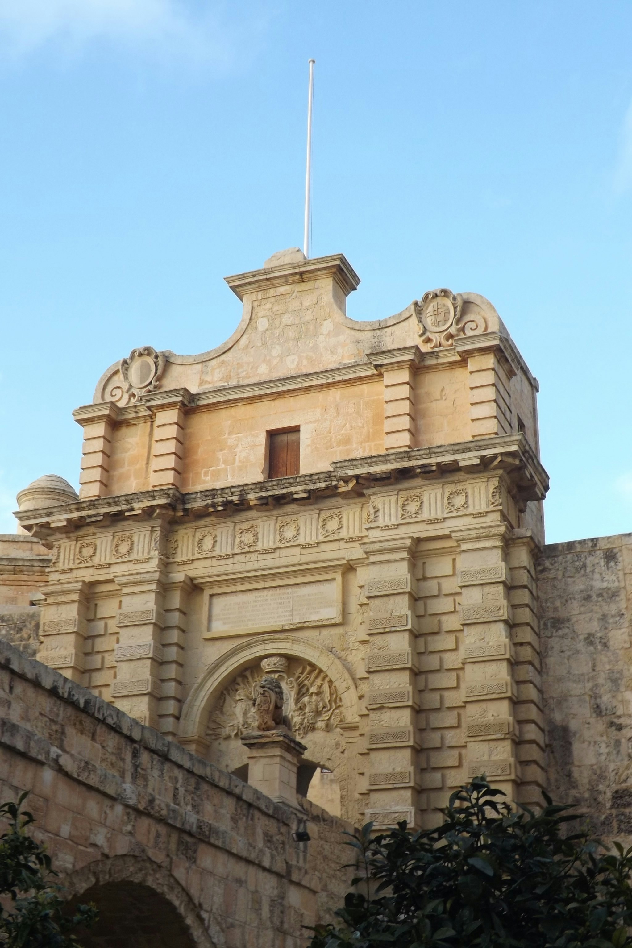 A tall building with a clock on top of it