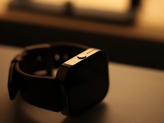 A smart watch sitting on top of a table