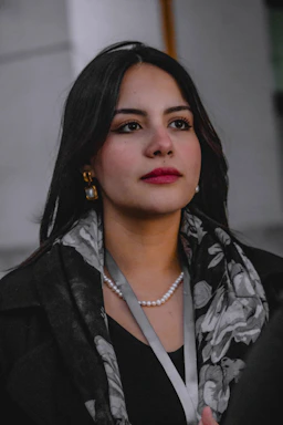 A woman with a scarf around her neck