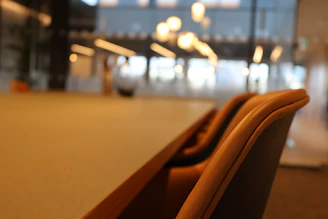 A close up of a table with a blurry building in the background
