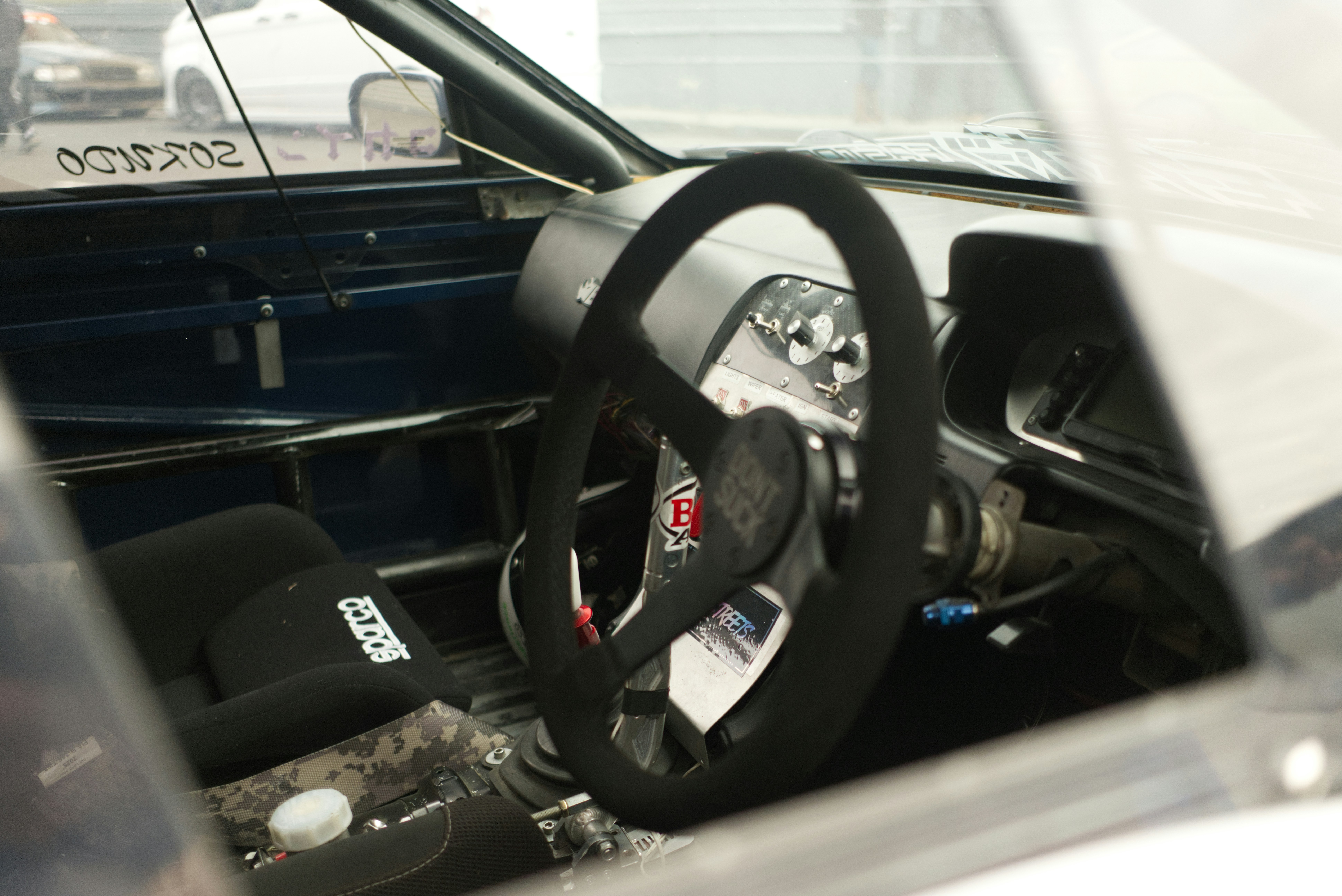 2013 Nissan Leaf interior with central touchscreen and digital gauge cluster