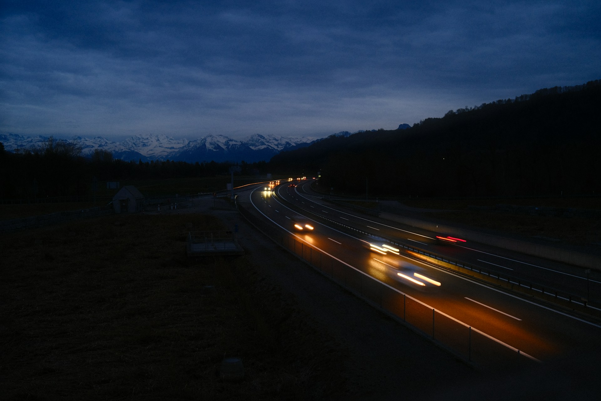 A blurry photo of a highway at night