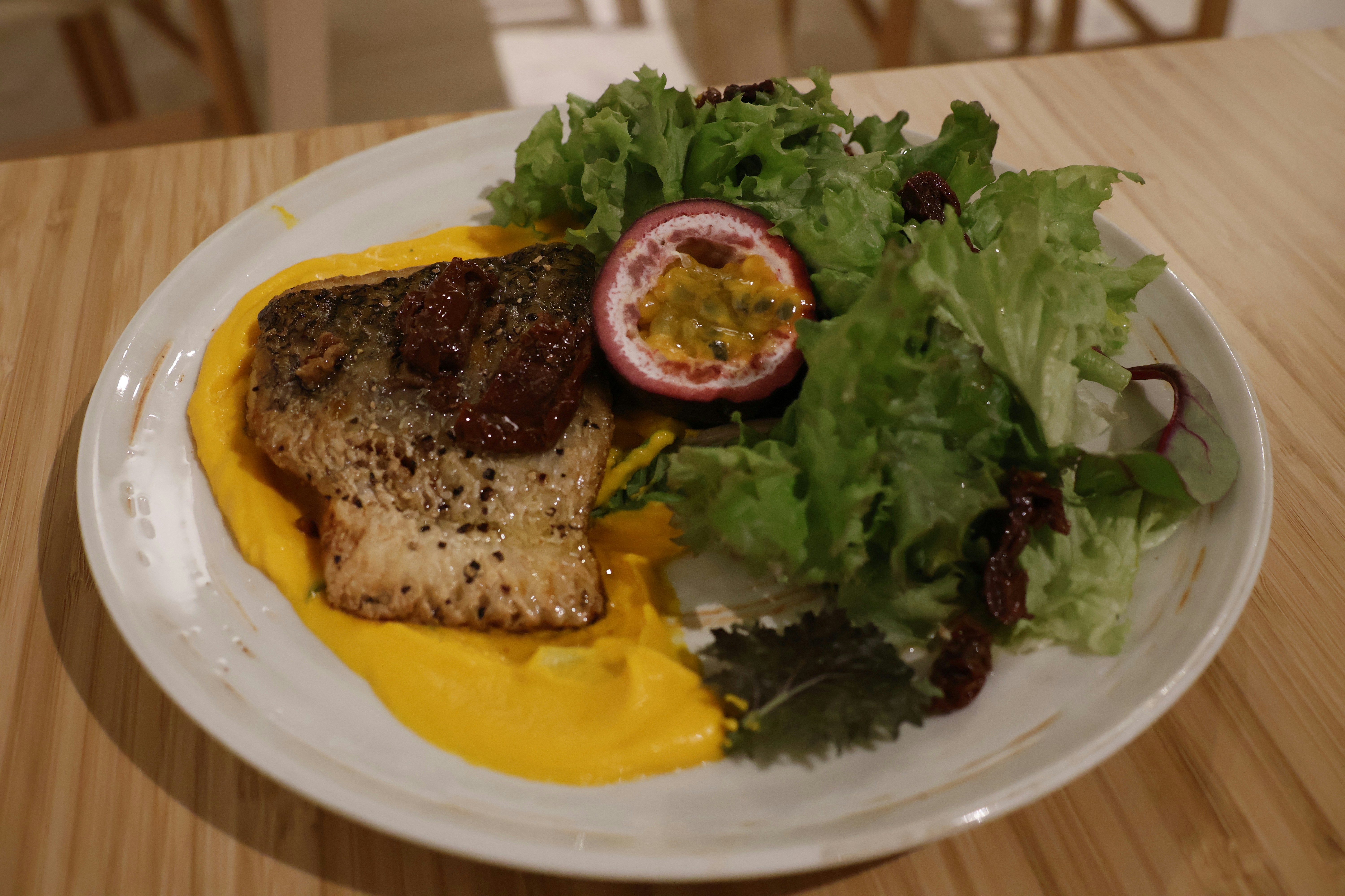 Barramundi w/ Carrot Butter ~ Pan fried barramundi fillet with buttery carrot puree & a side of apple cider vinaigrette salad.